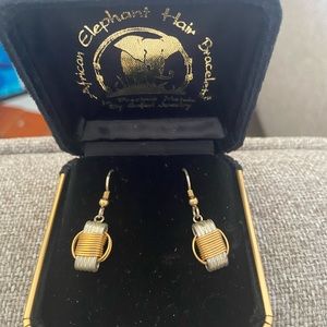African “elephant hair” earrings in white and yellow gold.